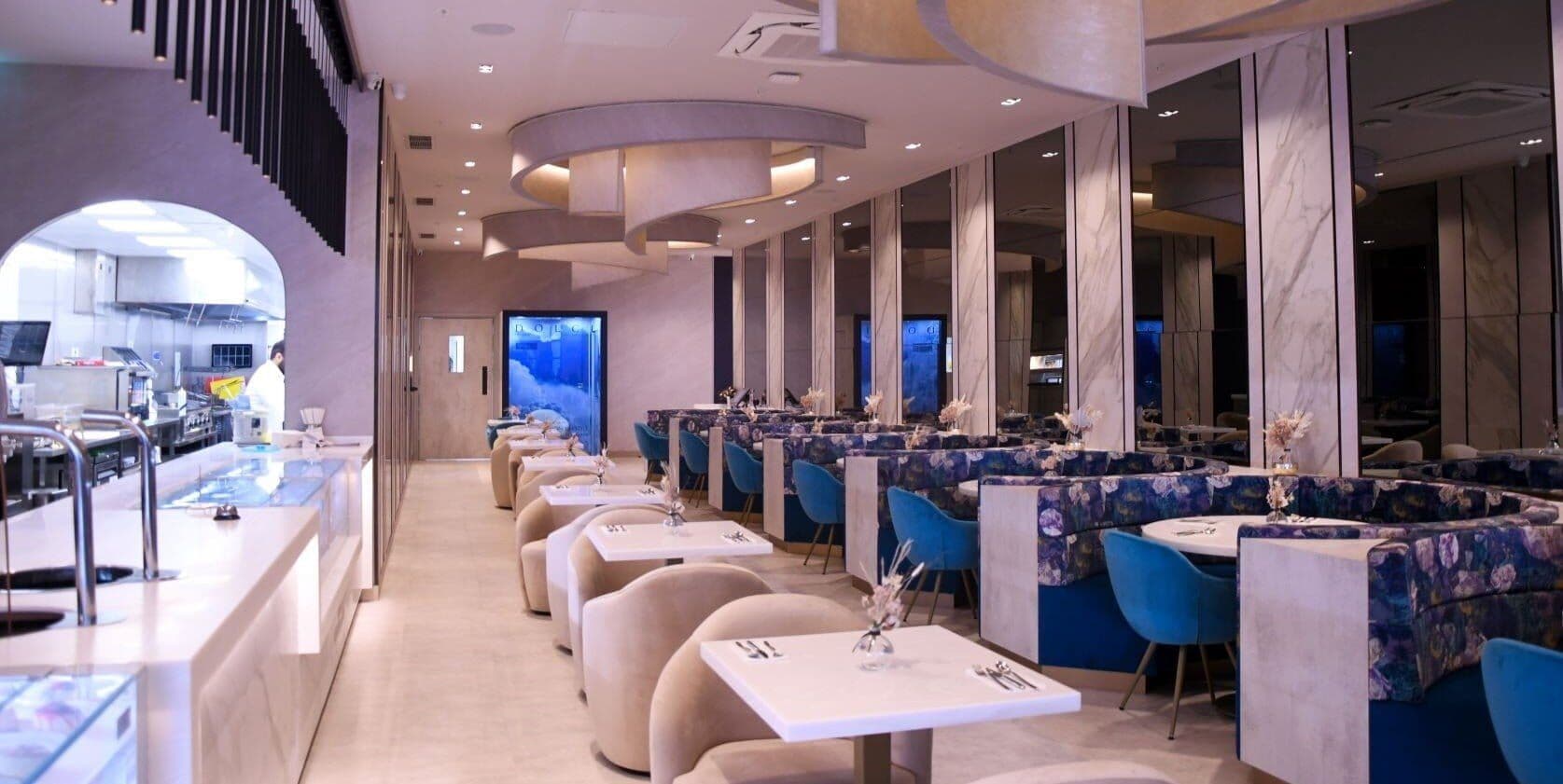 Haute Dolci at The O2: sapphire velvet chairs, patterned booths and sculpted ceiling rings
